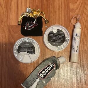 Assorted Craft Supplies with Gems and Glue